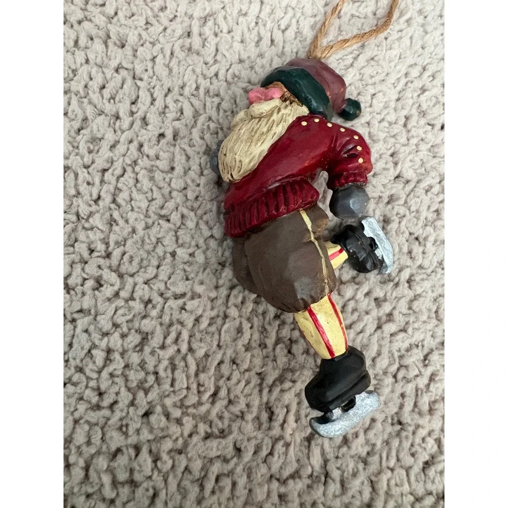 Vintage 2001 BIC Ice Skating Santa Christmas Ornament Red Sweater Folk Art